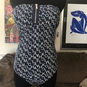 Dark blue with white letters. Stripes added